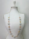 Necklace with floral designs on a mannequin 
