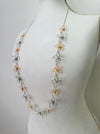 Necklace with floral designs on a mannequin