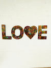 front view of mosaic love letters