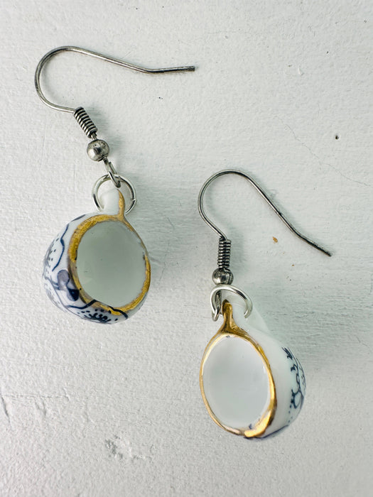 a pair of mini porcelain tea cup drop earrings with floral design
