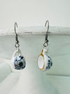 a pair of mini porcelain tea cup drop earrings with floral design