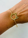 Minimalist gold-tone cat silhouette racelet with open bangle design