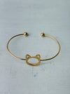 Minimalist gold-tone cat silhouette racelet with open bangle design