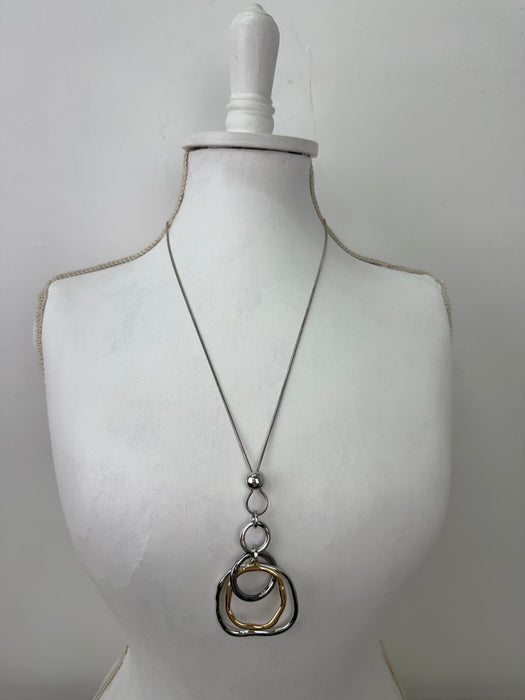 Mixed metal necklace with layered geometric pendants
