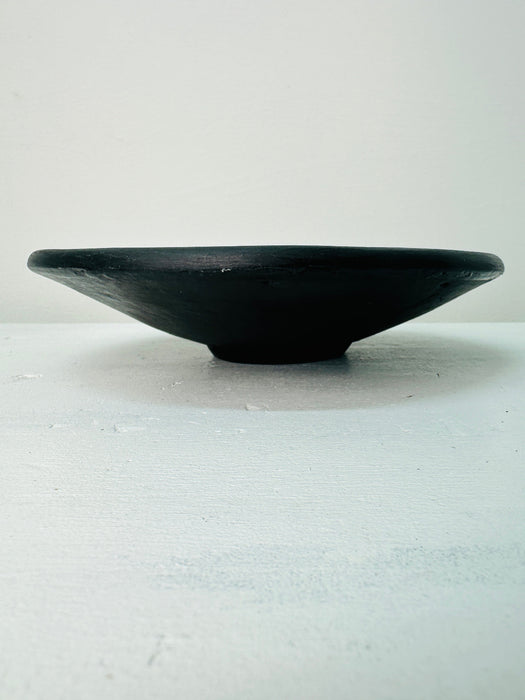 Side view of small mosaic Sterope bowl showing terracotta base and multicoloured glass mosaic surface on white background.