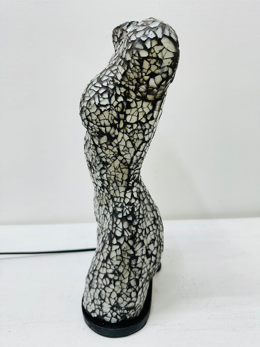 Side view of handcrafted silver mosaic lamp shaped as a female torso.