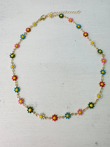 delicate necklace with small multicolour enamel flower charms on a fine chain