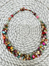 multicolour shell necklace with irregular beads laid flat