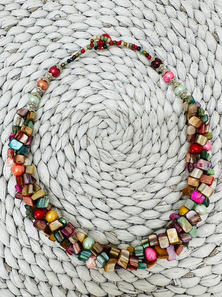 multicolour shell necklace with irregular beads laid flat