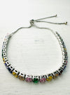 Bracelet with colorful gemstones on a white background