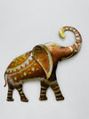 Large hand-painted metal elephant wall sculpture with gold, copper and silver detailing