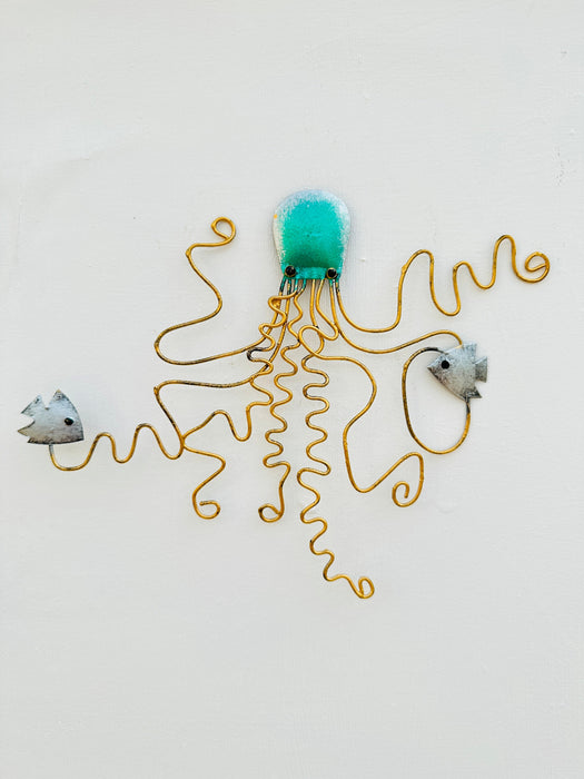 Hand-painted green metal octopus wall decoration with two small fish