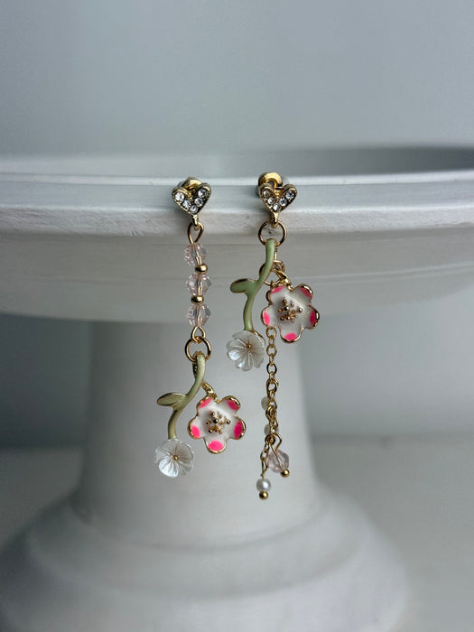 Floral drop earrings on a white background