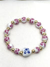 Bracelet with floral beads on a white background