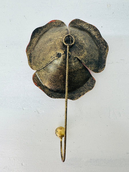 Back view of handmade poppy flower wall hook.