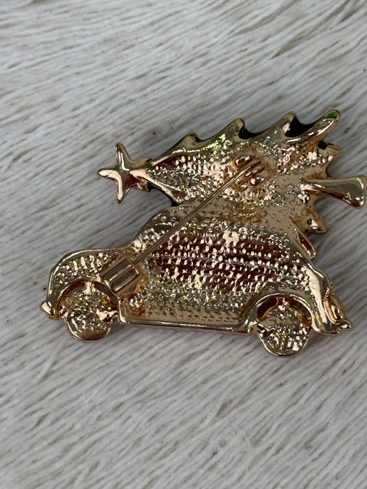 back of gold shaped brooch