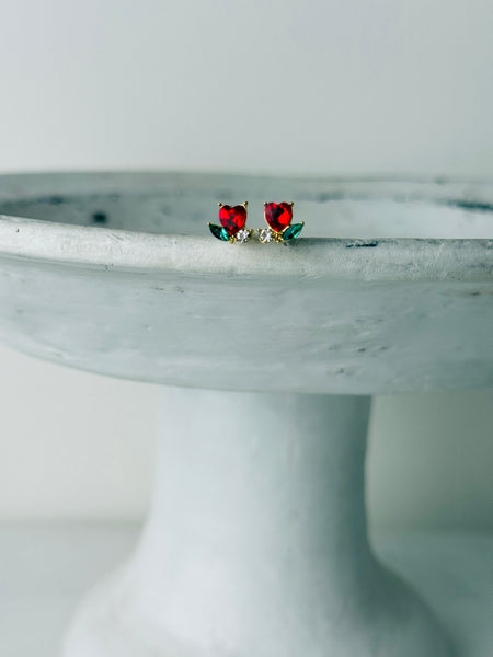 Heart-shaped stud earrings. 