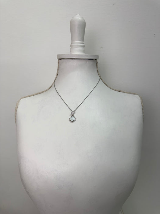 silver necklace with clover pendant white enamel and crystal detail