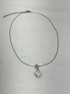 silver necklace with clover pendant white enamel and crystal detail