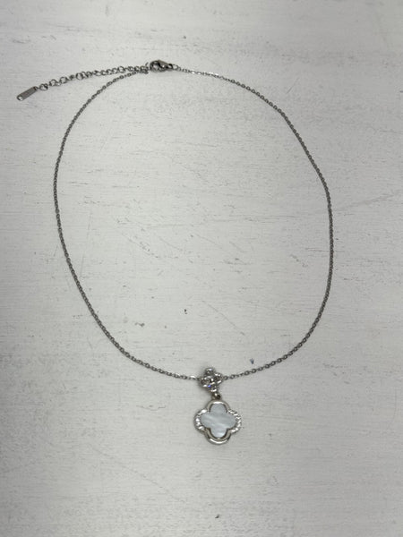 silver necklace with clover pendant white enamel and crystal detail