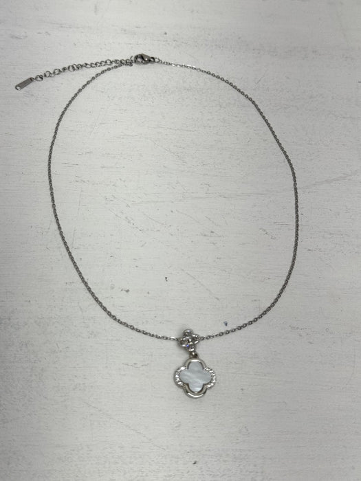 silver necklace with clover pendant white enamel and crystal detail