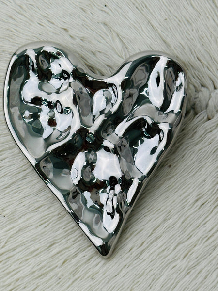 Silver heart-shaped brooch 