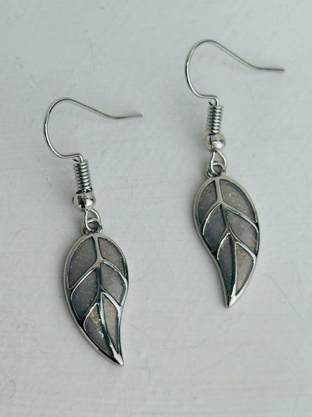 Silver-tone leaf dangle earrings with oxidised finish and etched details