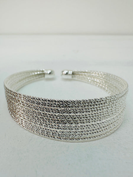 close-up of silver tone multi strand bracelet