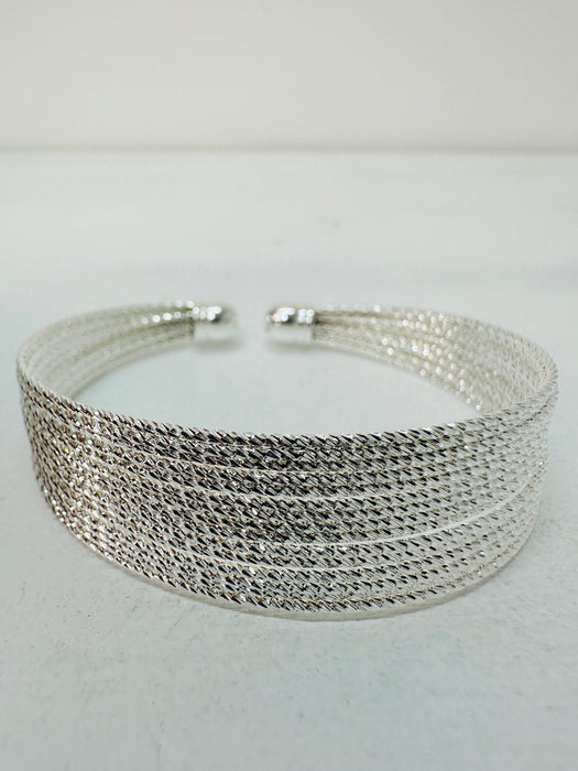 close-up of silver tone multi strand bracelet