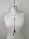 Silver slide necklace with adjustable chain and faceted teardrop pendants