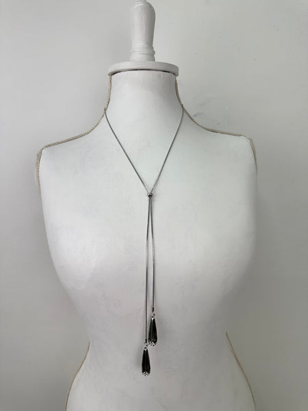 Silver slide necklace with adjustable chain and faceted teardrop pendants
