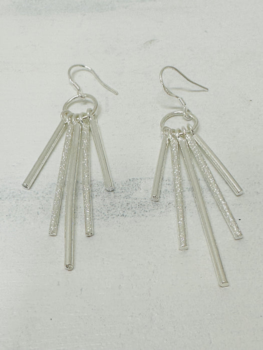flat lay of earrings