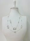 Necklace with rectangular pendants on a mannequin bust against a white background