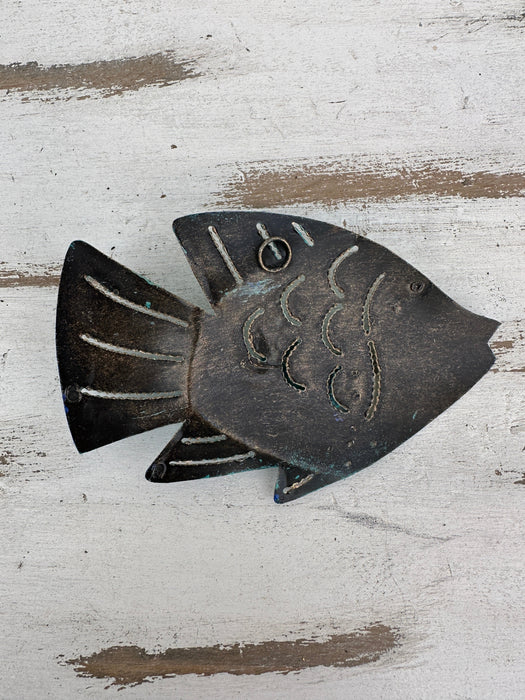 Back of turquoise metal reef fish wall art showing hanging point