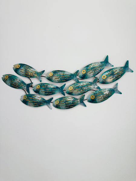 Small mottled aqua metal fish shoal wall art with 10 fish on a white background