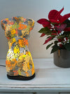 Small mosaic bust lamp illuminated in warm light, showcasing vibrant crackle glass colours.