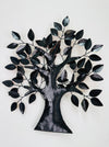 Back view of the metal oak tree wall sculpture showing mounted frame and hanging eyelets
