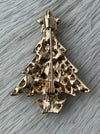 back of gold-coloured brooch 