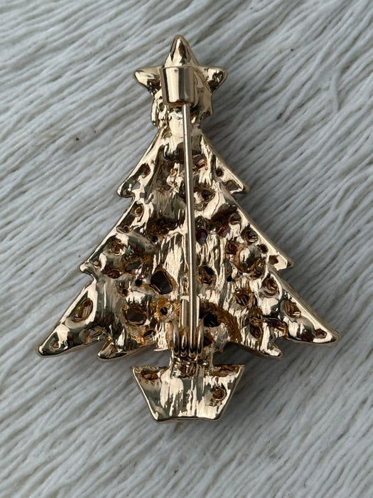 back of gold-coloured brooch 
