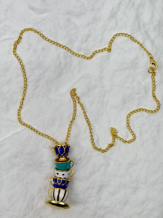flat view of tea cup necklace