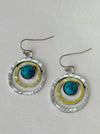 turquoise circle drop earrings wih silver and gold tone rings