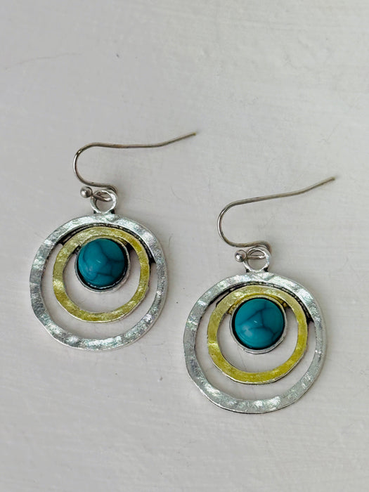 turquoise circle drop earrings wih silver and gold tone rings