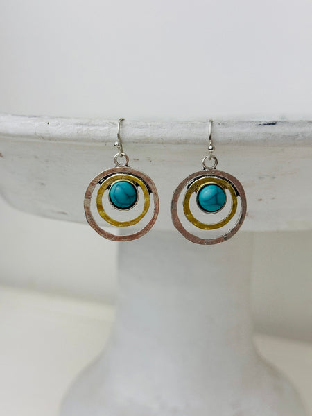 pair of turquoise circle drop earrings wih silver and gold tone rings