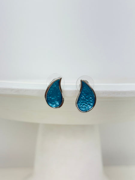 Turquoise teardrop enamel stud earrings with silver tone finish, displayed on a white background.