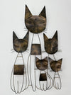 Back view of the metal cat family wall sculpture showing hidden hanging eyelets