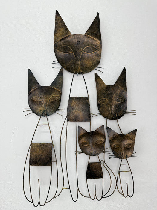 Back view of the metal cat family wall sculpture showing hidden hanging eyelets