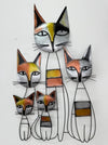 Close-up of the metal cat family showing hand-painted shading and details