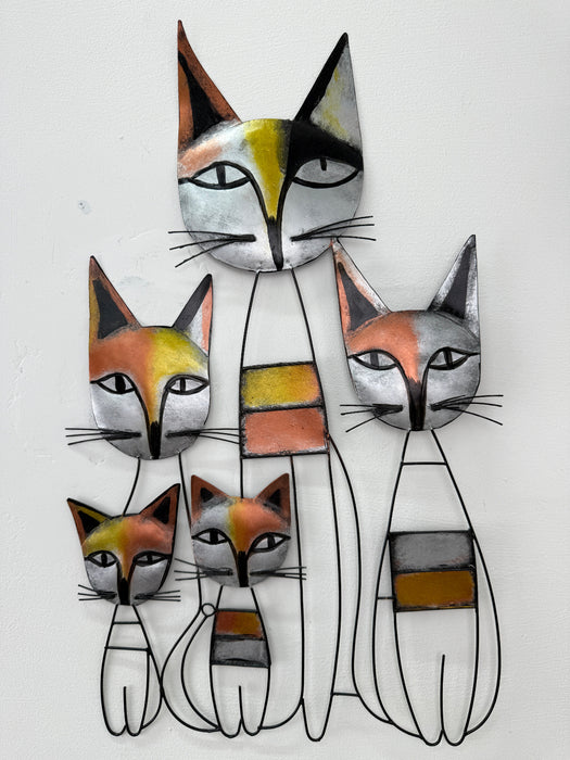 Close-up of the metal cat family showing hand-painted shading and details