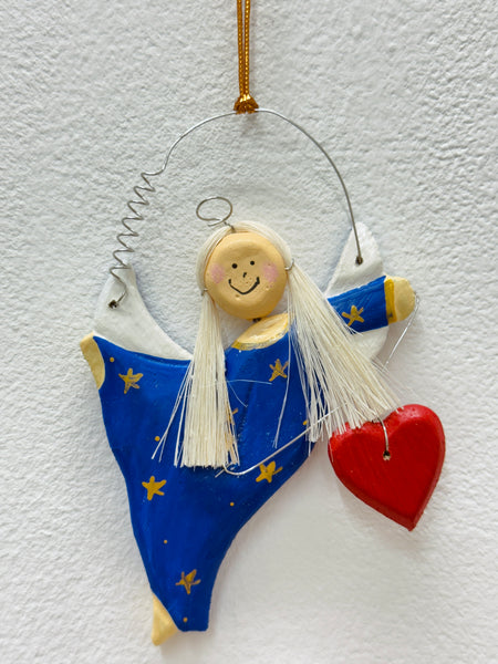 Hand-painted blue angel with gold stars and red heart.
