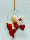 Hand-painted red angel with gold stars and red heart.